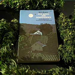 5 Acres and Indpendence book surrounded by buds